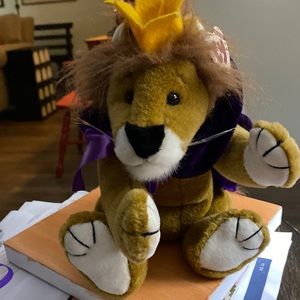 Lion with crown and purple cape